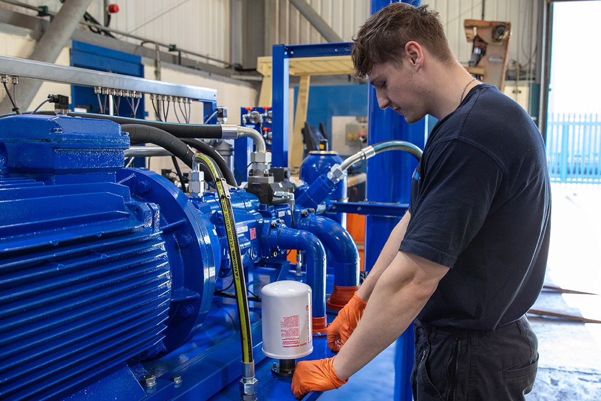 Flowtech engineer servicing a hydraulic power pack