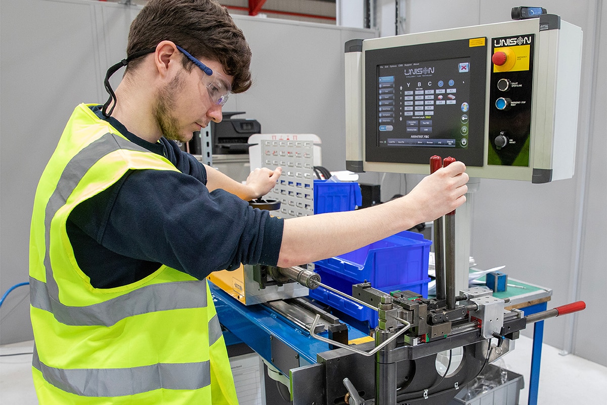 Flowtech engineer in a workshop